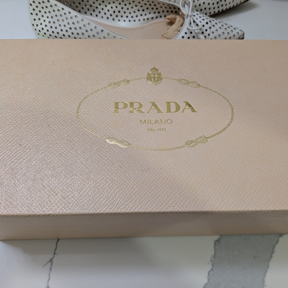 Prada White Perforated Leather Pointed-Toe Flats with Bow Accent - Picture 2 of 7